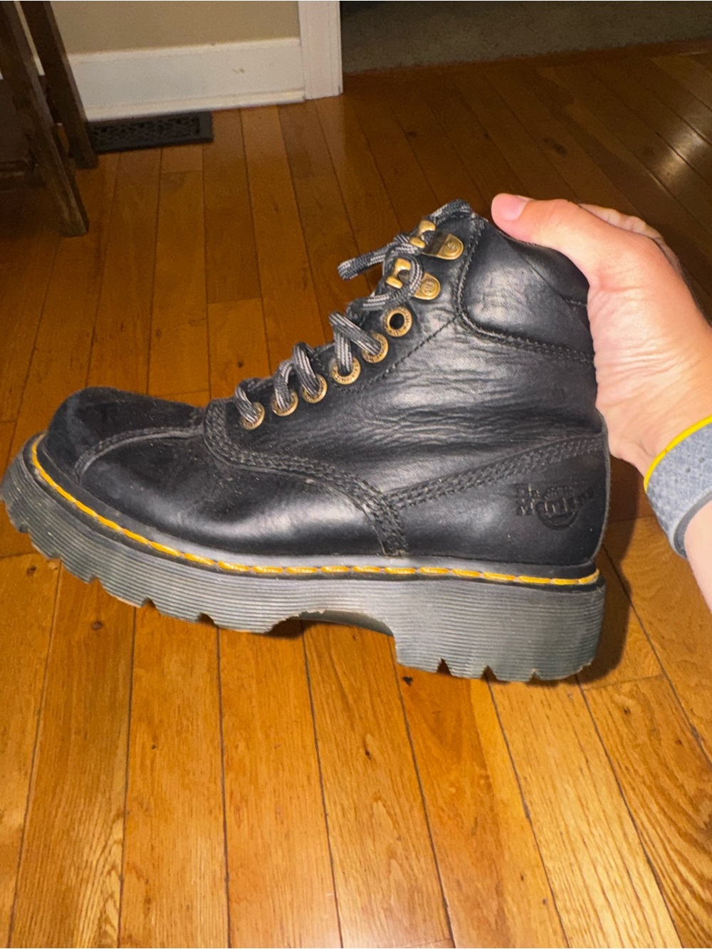 Dr. Martens Black Leather Combat Boot with Yellow Stitching